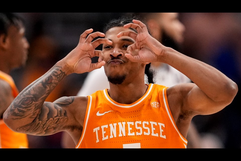 Tennessee guard Zakai Zeigler (5) celebrates after a basket against Auburn during the second half of an NCAA college basketball game in the semifinal round of the Southeastern Conference tournament, Saturday, March 15, 2025, in Nashville, Tenn. (AP Photo/George Walker IV)