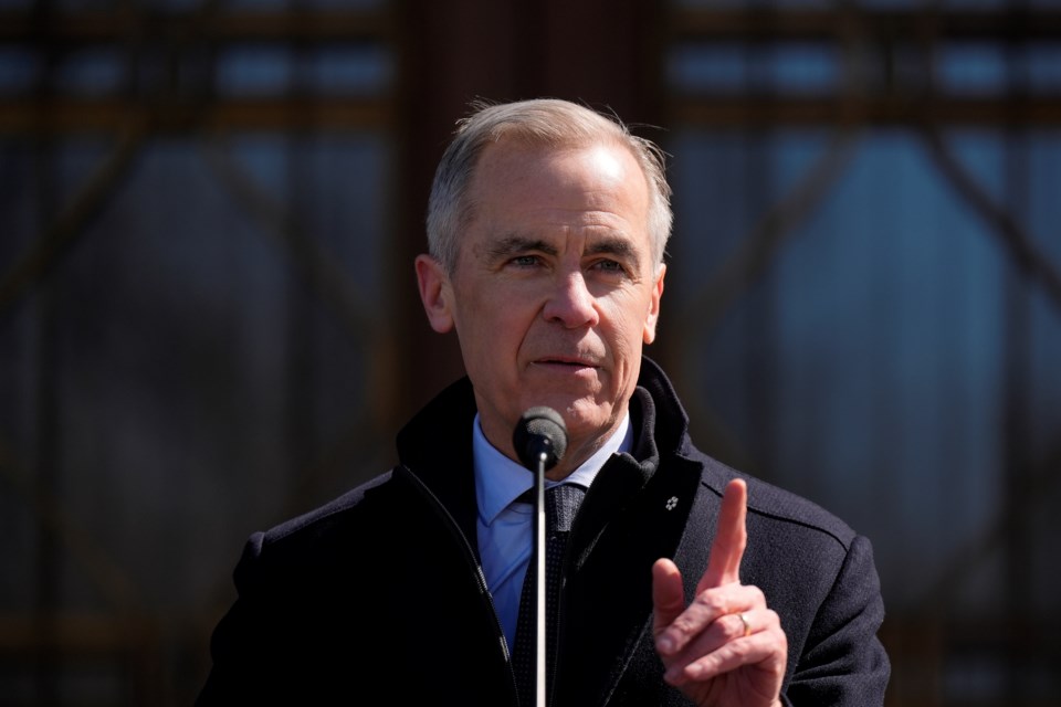 Prime Minister Mark Carney speaks to media at Rideau Hall, where he asked the Governor General to dissolve Parliament and call an election, in Ottawa, Sunday, March 23, 2025. (Adrian Wyld /The Canadian Press via AP)