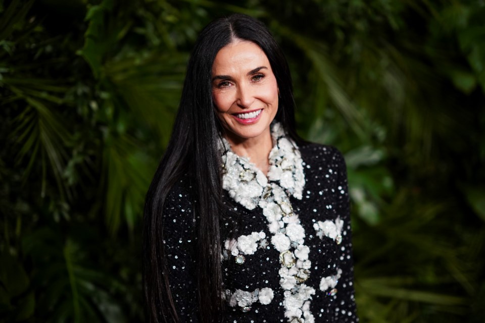 Demi Moore arrives at Chanel's 16th Annual Pre-Oscar Awards Dinner on Saturday, March 1, 2025, at The Beverly Hills Hotel in Beverly Hills, Calif. (Photo by Jordan Strauss/Invision/AP)