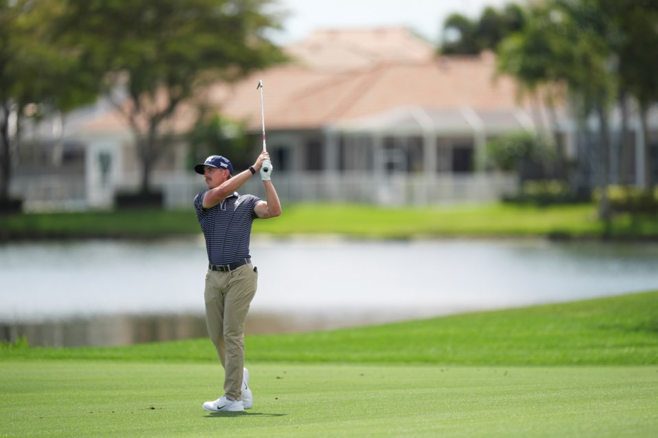 Jake Knapp hits on the 18th hole during the first round of the Cognizant Classic golf tournament, Thursday, Feb. 27, 2025, in Palm Beach Gardens, Fla. (AP Photo/Rebecca Blackwell)