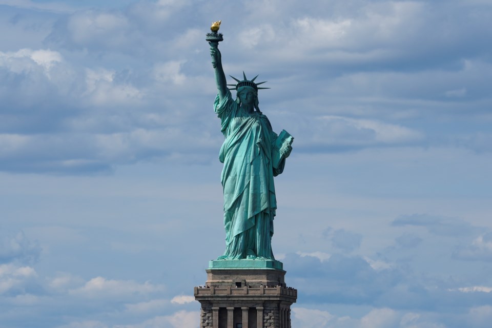 FILE - The Statue of Liberty is seen from the Staten Island Ferry, Monday, Sept. 9, 2024, in New York. (AP Photo/Pamela Smith, file)