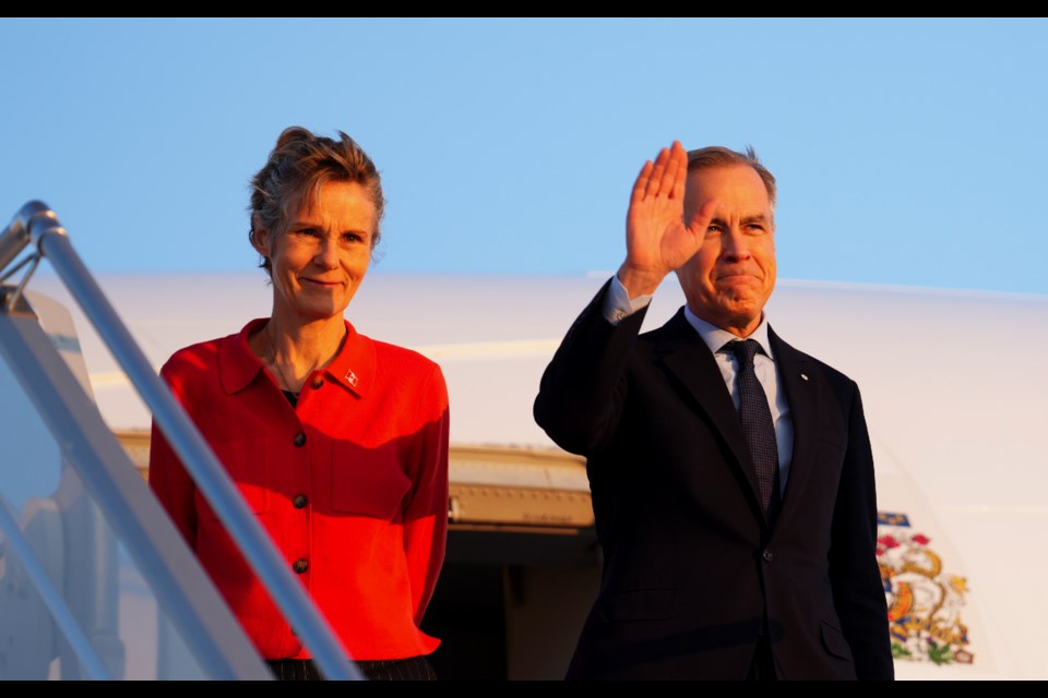 Canada's Prime Minister Mark Carney and wife Diana Fox Carney arrive in Paris, Monday, March 17, 2025. (Sean Kilpatrick/The Canadian Press via AP)