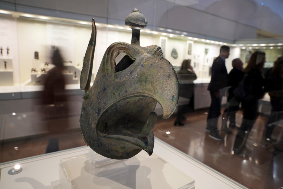 An ancient bronze griffin head is returned to Greece from New York in a ...