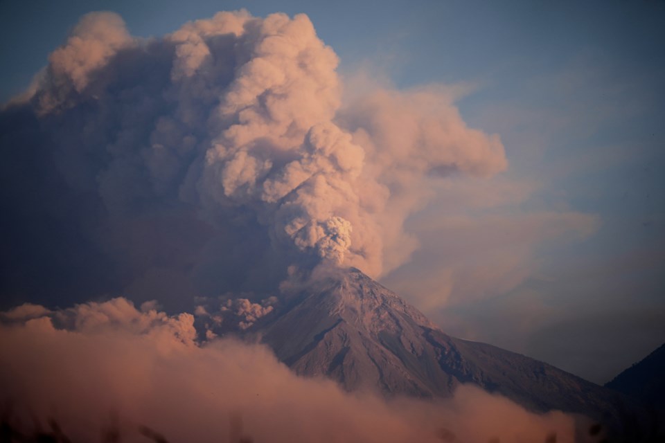 The "Volcan de Fuego," or Volcano of Fire, blows a cloud of ash seen from Palin, Guatemala, Monday, March 10, 2025. (AP Photo/Moises Castillo)