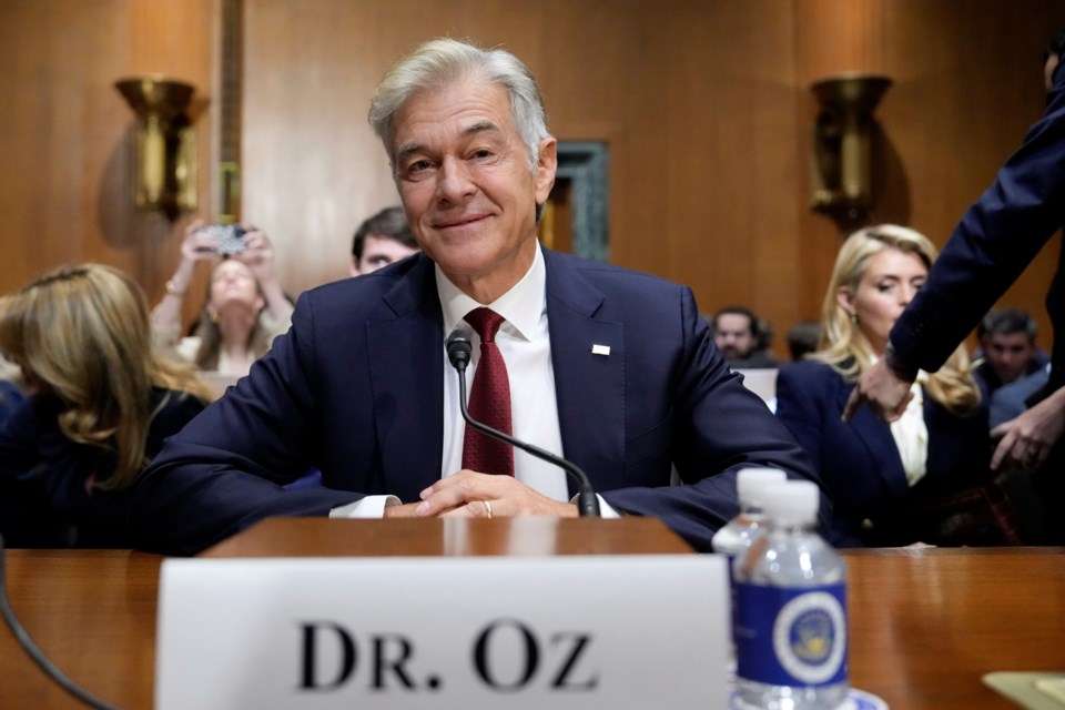 Dr. Mehmet Oz, President Donald Trump's pick to lead the Centers for Medicare and Medicaid Services, sits before testifying at his confirmation hearing before the Senate Finance Committee, on Capitol Hill in Washington, Friday, March 14, 2025. (AP Photo/Ben Curtis)