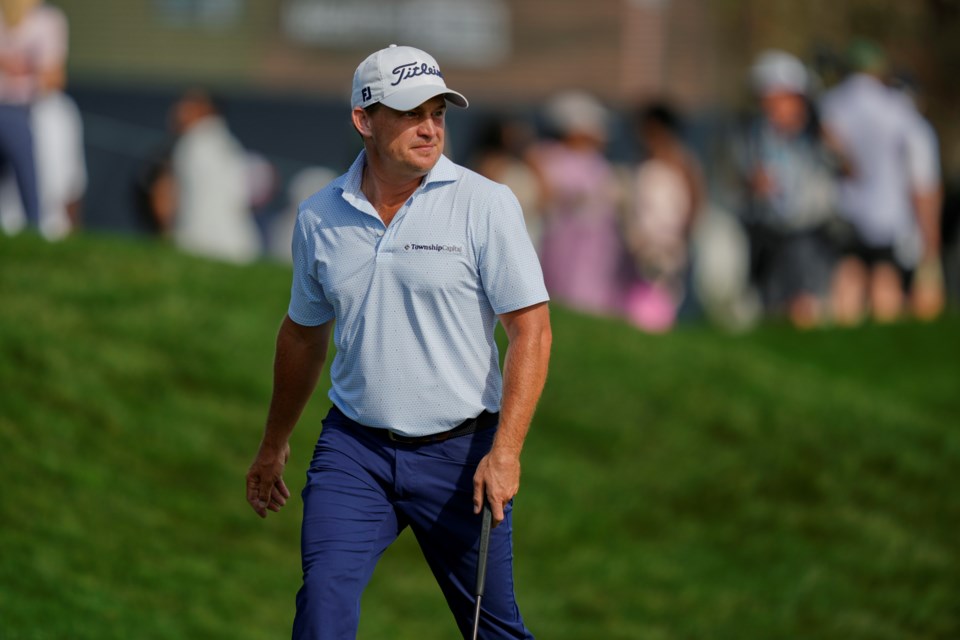 Bud Cauley looks over the 18th green during the third round of The Players Championship golf tournament Saturday, March 15, 2025, in Ponte Vedra Beach, Fla. (AP Photo/Julia Demaree Nikhinson)