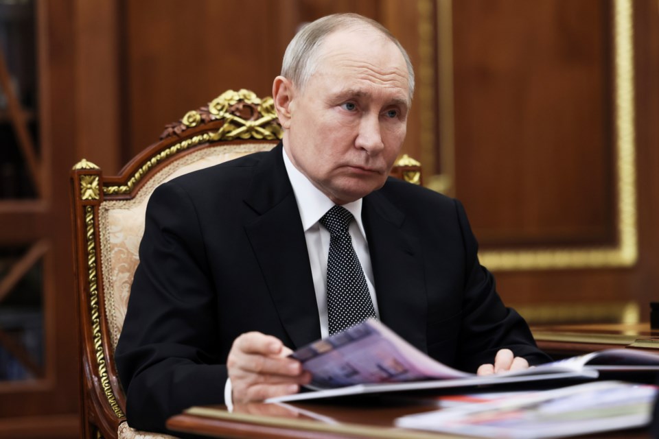 Russian President Vladimir Putin speaks with the governor of Perm territory Dmitry Makhonin during their meeting at the Kremlin in Moscow, Russia, Monday, March 10, 2025. (Mikhail Metzel, Sputnik, Kremlin Pool Photo via AP)