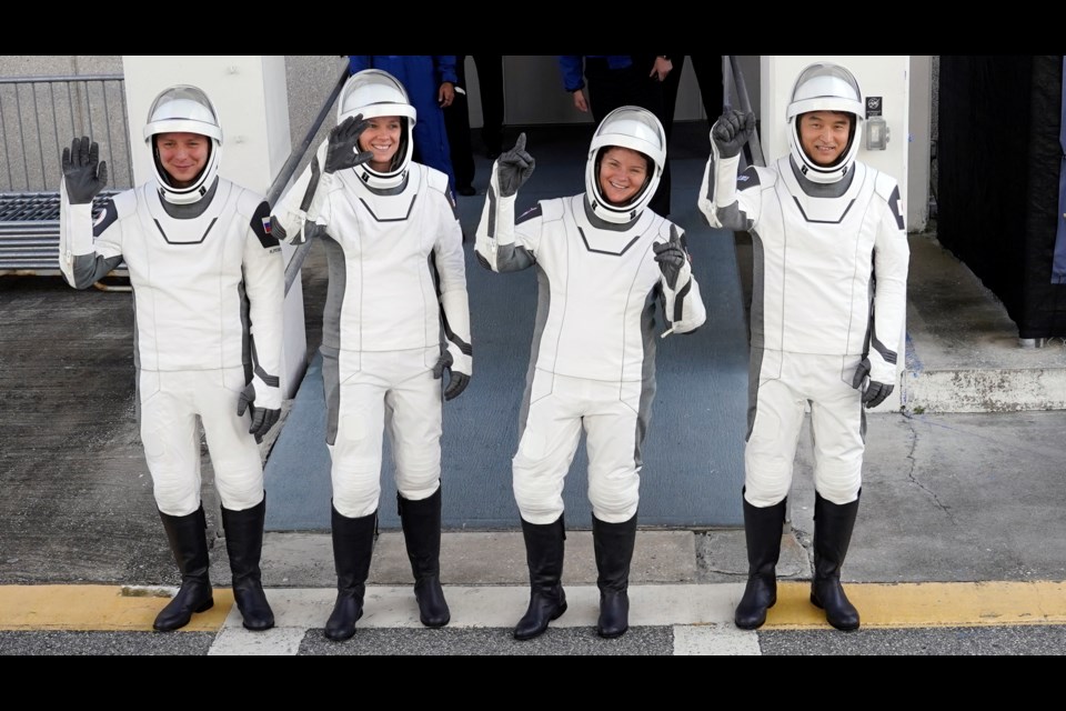 Crew10 members, from left, cosmonaut Kirill Peskov, astronaut Nichole Ayers, astronaut Anne McClain and JAXA astronaut Takuya Onishi leave the Operations and Checkout building before heading to Launch Pad 39-A at the Kennedy Space Center in Cape Canaveral, Fla., for a mission to the International Space Station in Cape Canaveral, Fla., Friday, March 14, 2025. (AP Photo/John Raoux)