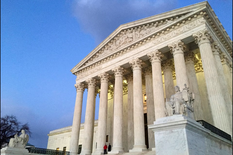 FILE - The Supreme Court at sunset in Washington, Feb. 13, 2016. (AP Photo/Jon Elswick, File)