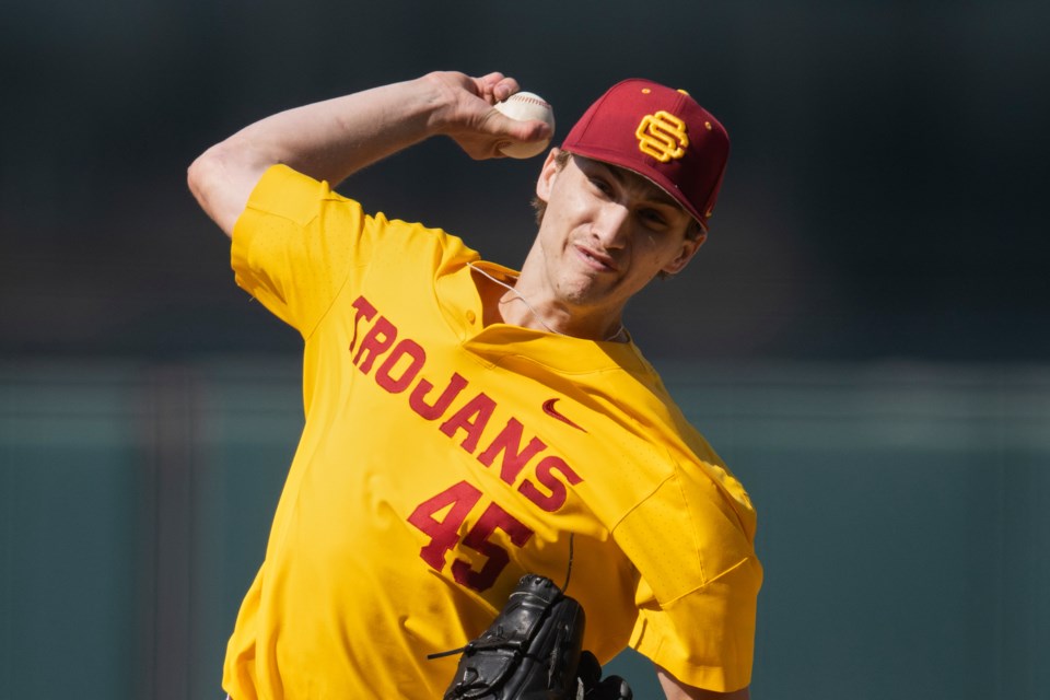 FILE - Southern California starting pitcher Jaden Agassi (45) delivers a pitch during an NCAA baseball game against Santa Clara on Sunday, Feb. 20, 2022, in Los Angeles. (AP Photo/Kyusung Gong, File)