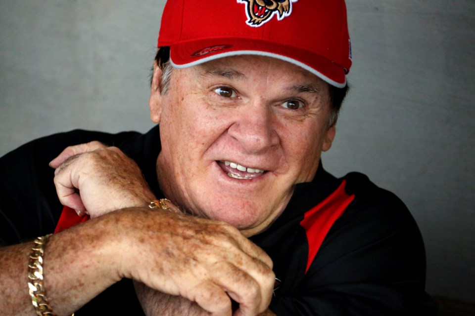 FILE - Pete Rose sits in the Washington Wild Things dugout before a Frontier League baseball game against the Lake Erie Crushers in Washington, Pa, Tuesday, June 30, 2015. (AP Photo/Gene J. Puskar, File)