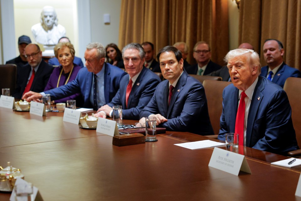 President Donald Trump speaks during a Cabinet meeting at the White House in Washington, Wednesday, Feb. 26, 2025. (Pool via AP)