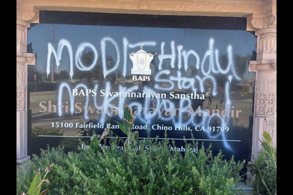 A sign displayed at the BAPS Shri Swaminarayan Mandir, a Hindu temple, is defaced with anti-India and anti-Hindu graffiti in Chino Hills, Calif., on March 7, 2025. (BAPS Swaminarayan Sanstha via AP)