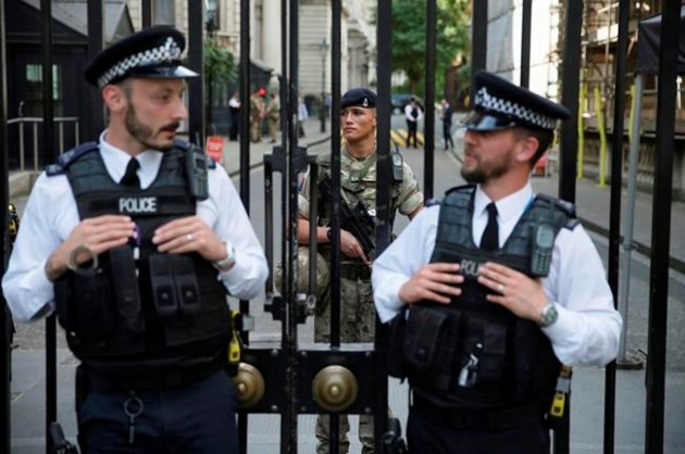 Raids, arrests as on-edge UK seeks 'network' of attackers