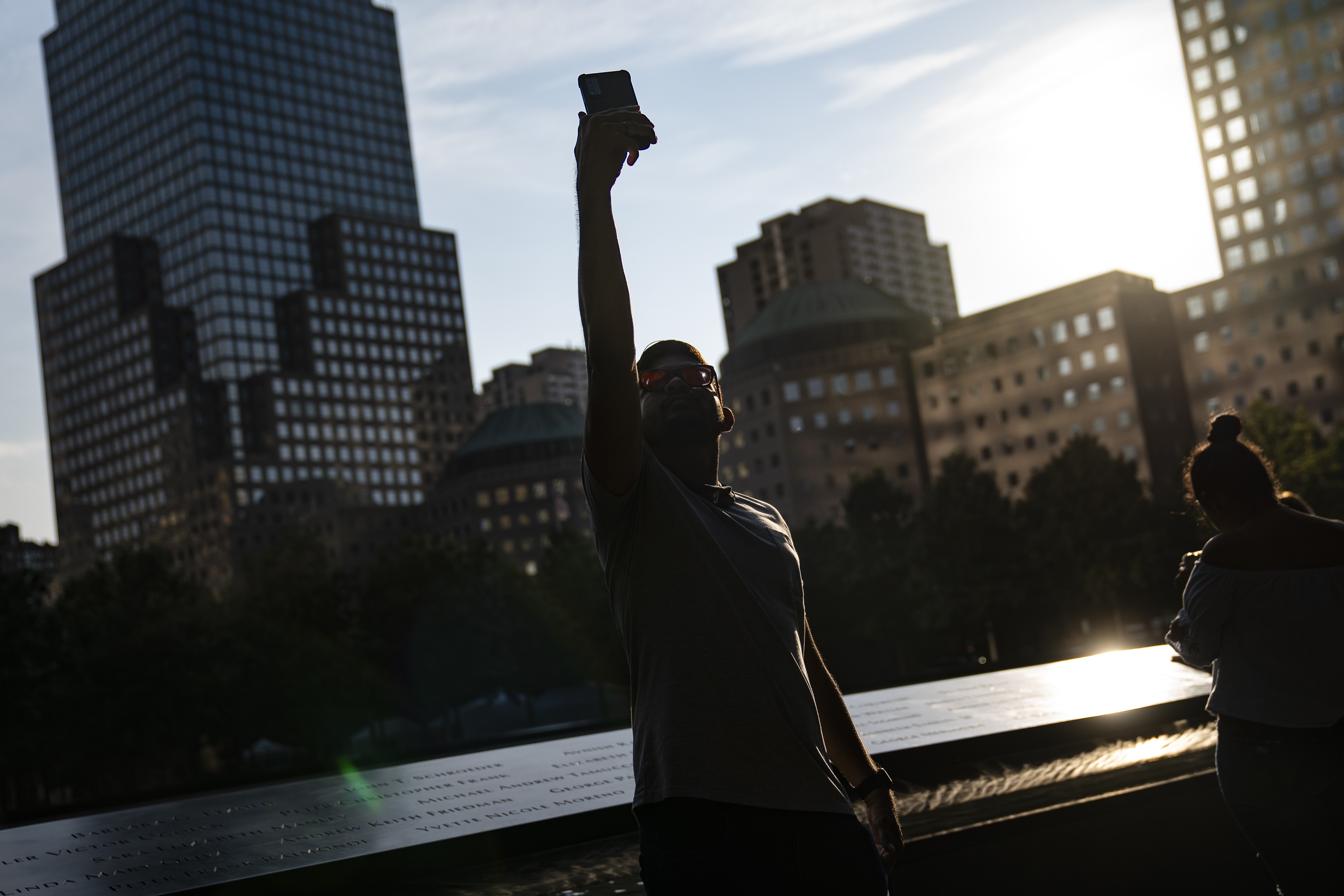 Ground zero: A selfie stop for some. A cemetery for others.