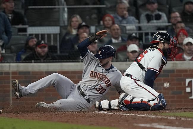 Correa, Astros rally past Braves 9-5, cut WS deficit to 3-2