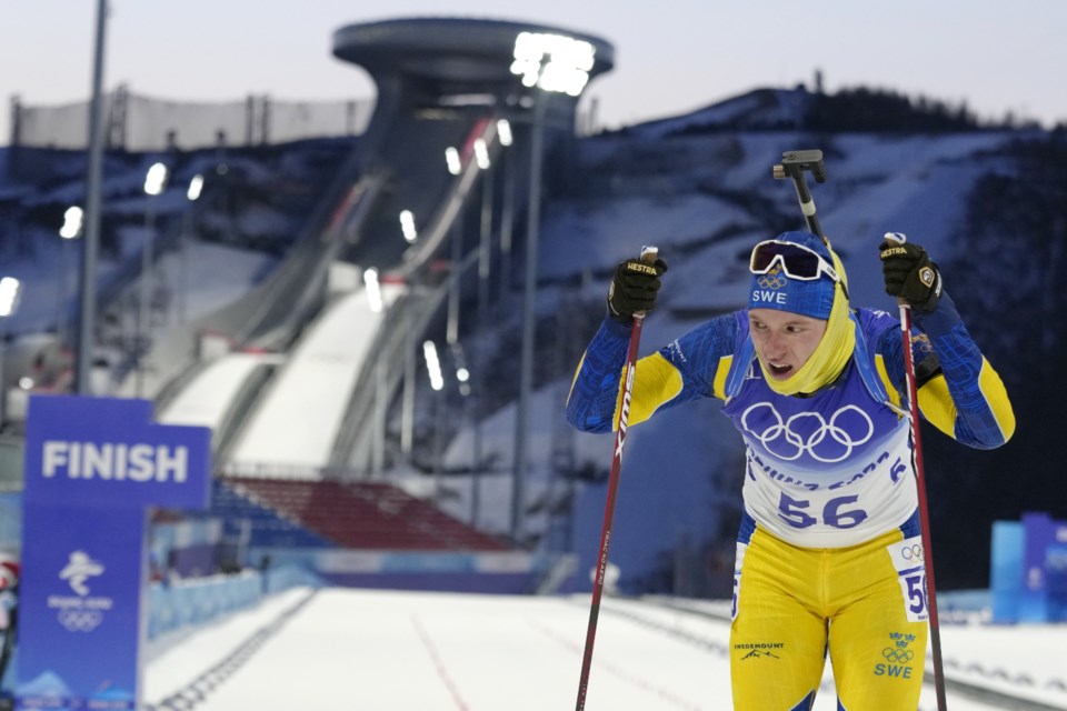 Winter Olympics 2022: Norway's Boe brothers share podium after winning  biathlon gold and bronze