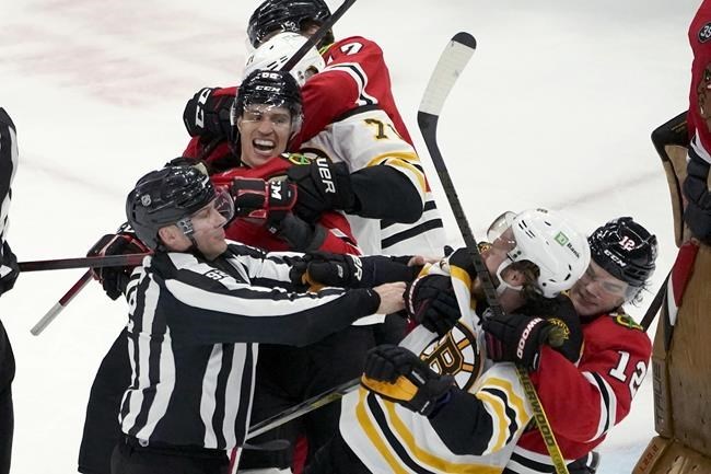 Grzelcyk scores late as Bruins beat Maple Leafs 4-3