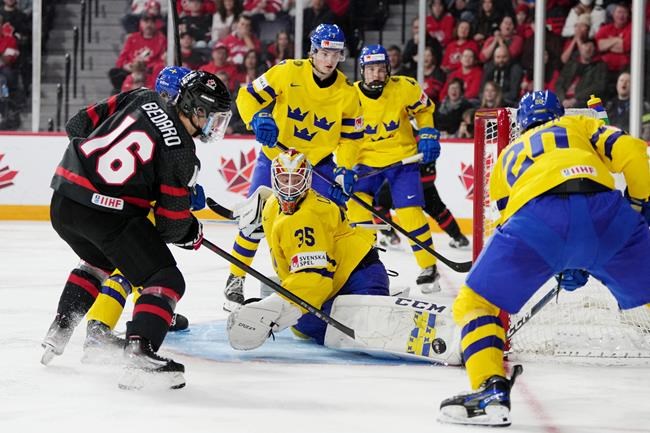 Bedard continues to chase history as Canada takes on Sweden at