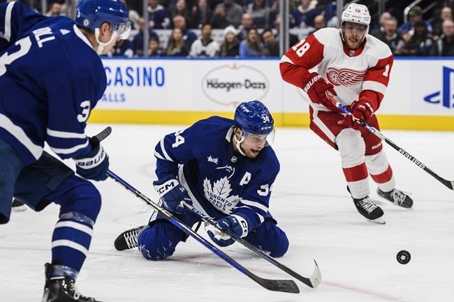 Mitchell Marner nets 500th point as Leafs trip up Wings