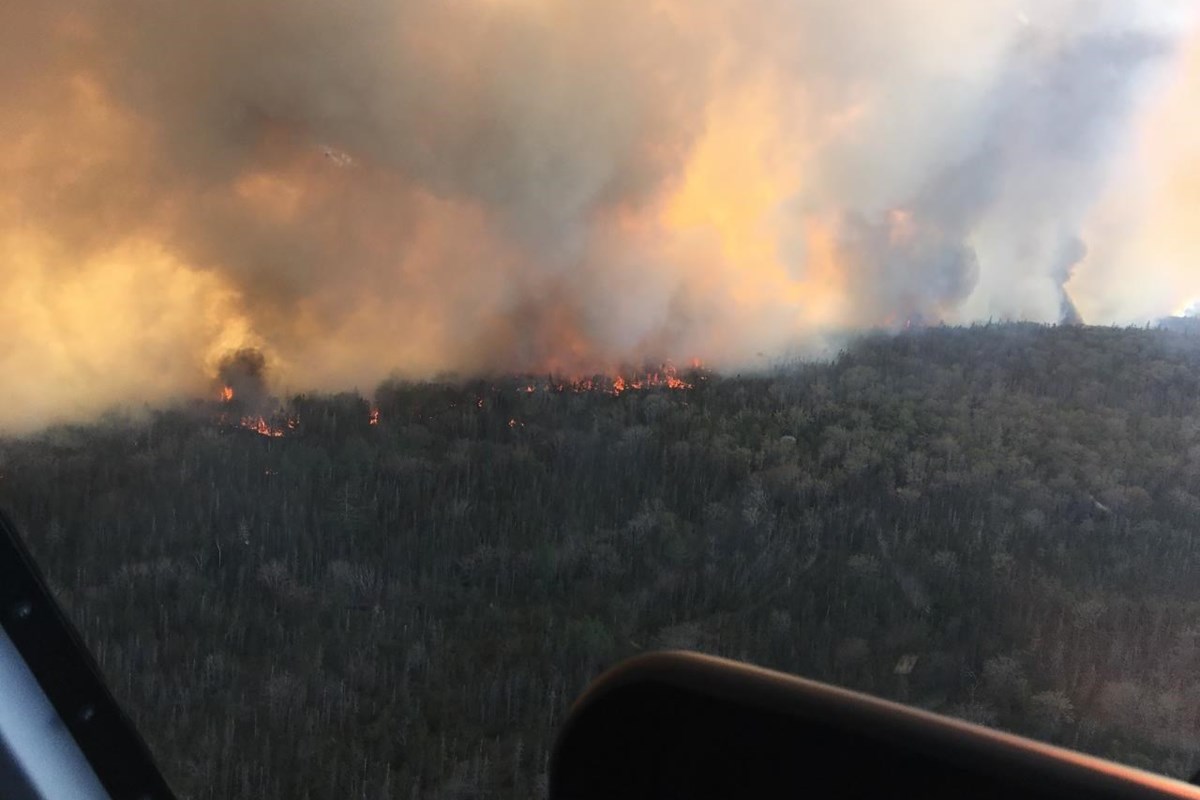 Nova Scotia wildfire burns out of control as hot, windy weather