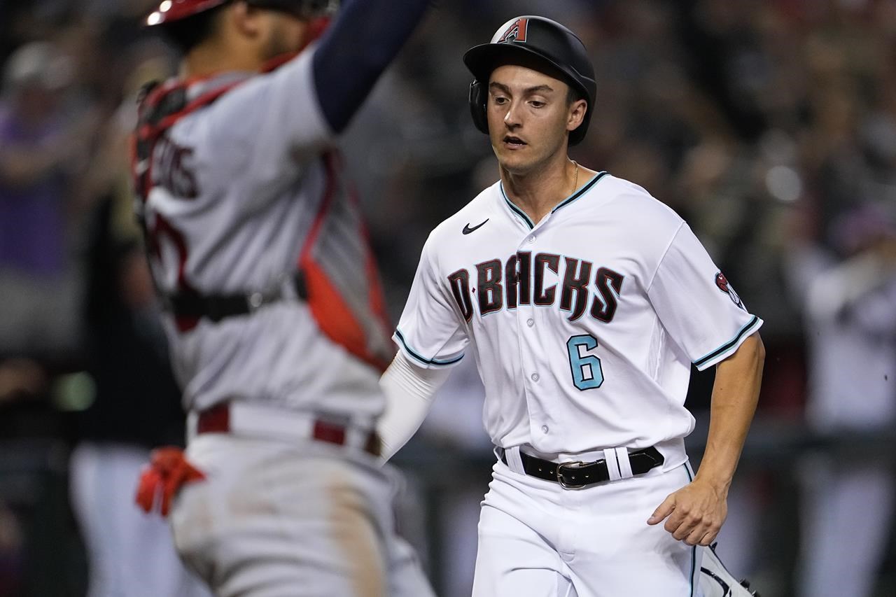 Carroll's 2-run triple in the 8th rallies Diamondbacks past Cardinals 3-1  to snap a 5-game skid