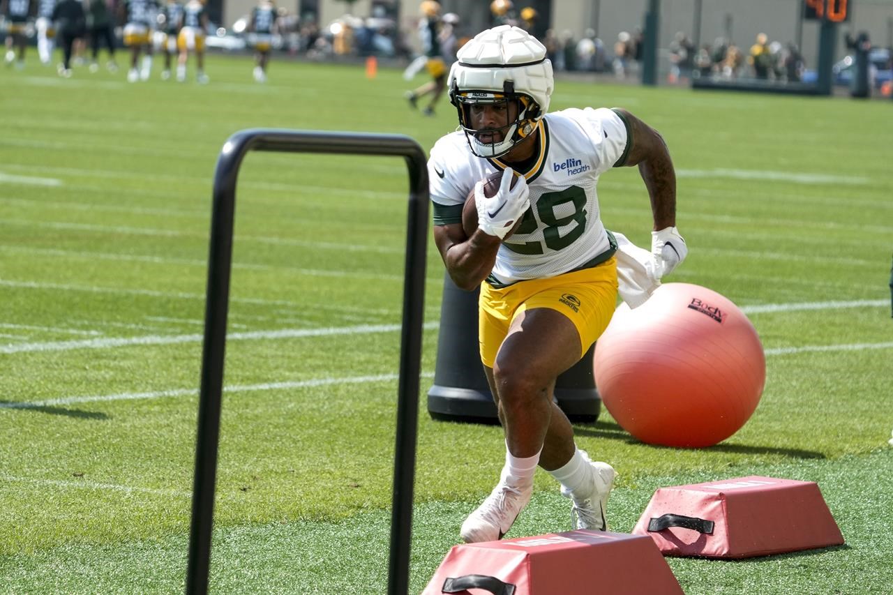 New London's AJ Dillon eager to rebound with Packers after busy offseason  in which he wrote a book and became a dad