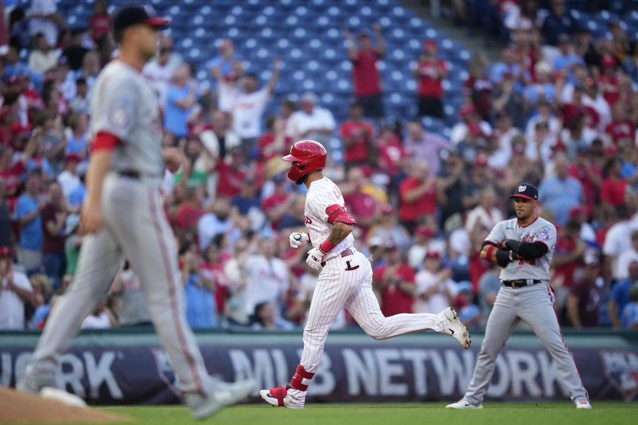 Singleton homers twice to lead Astros over Angels 11-3