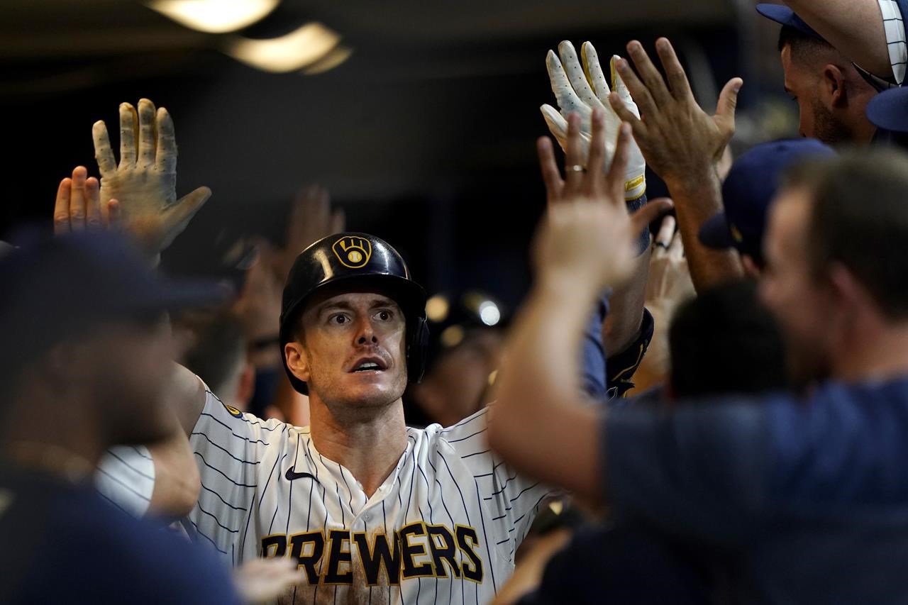 Canha's grand slam in 8th gives NL Central-leading Brewers a 9-5 victory  over Nationals 