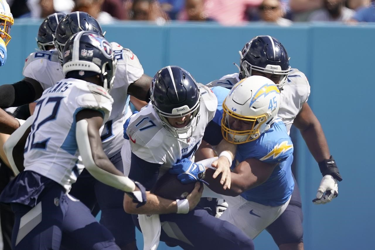 Ryan Tannehill Leads Titans Past Chargers in OT