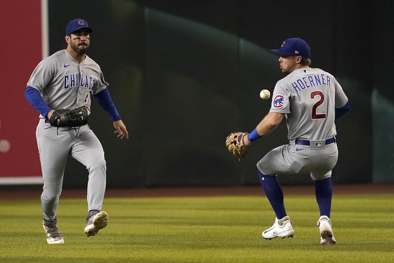 Giants open 9-run lead, hang to to beat Rockies 11-10 and stop slide