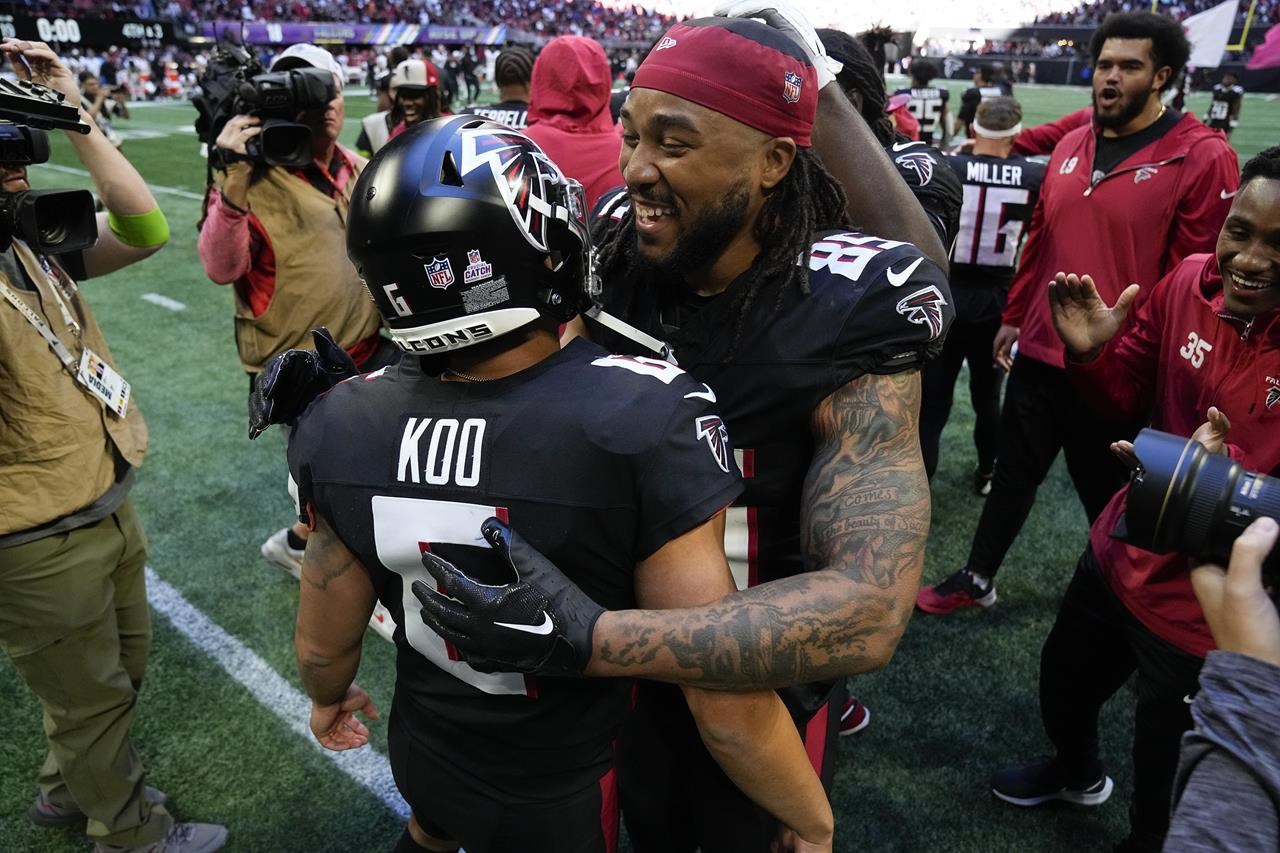 Younghoe Koo of the Atlanta Falcons celebrates after kicking a