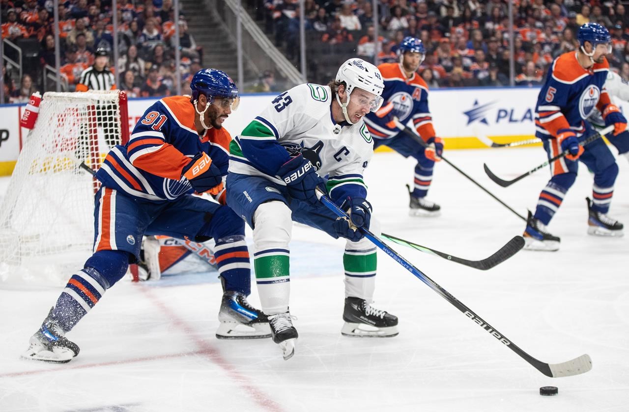 Hughes, emerging on and off ice, helps Canucks make positive Pride