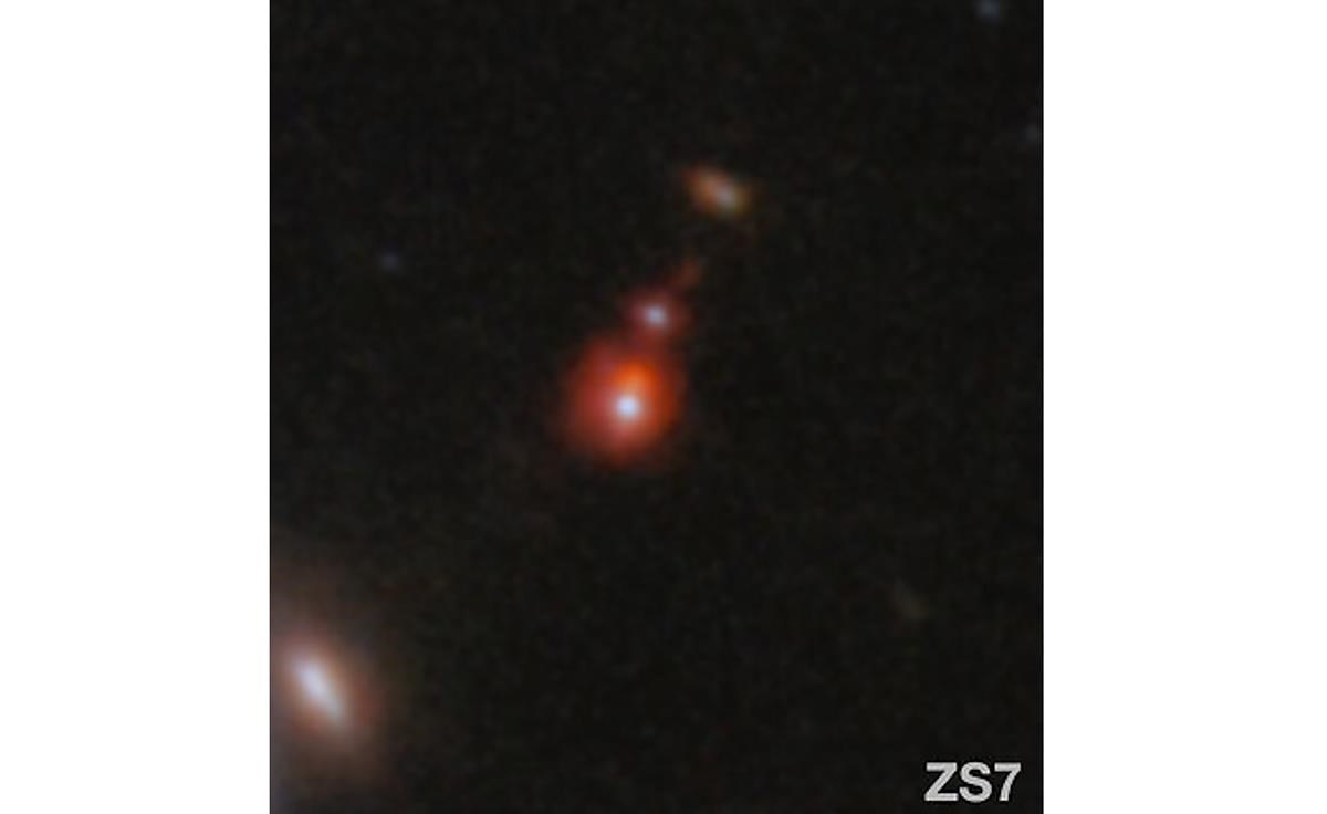 Webb telescope uncovers merger of two massive black holes from early ...