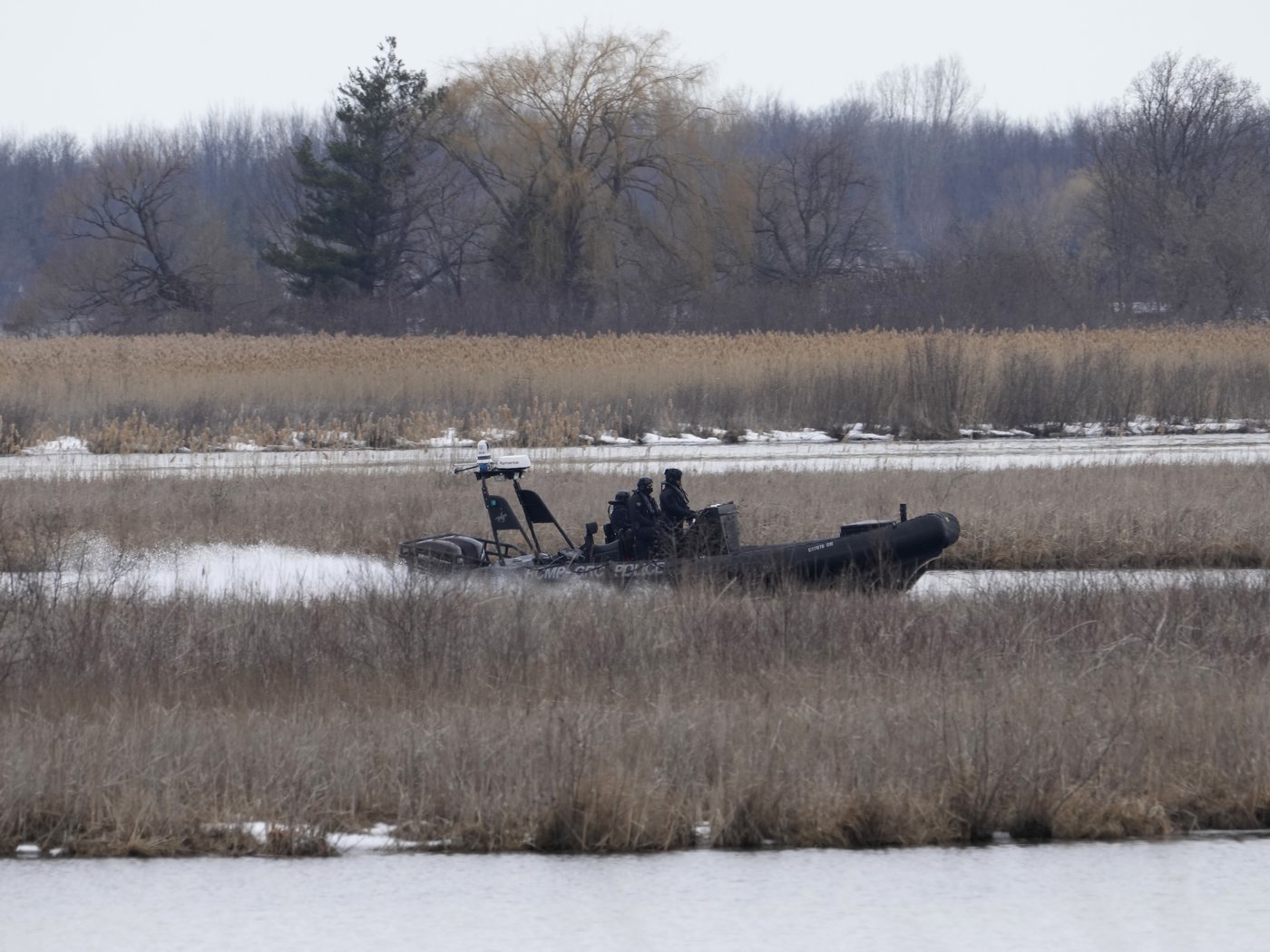 Police boat searching the area in Akwesasne, Quebec, March 31, 2023