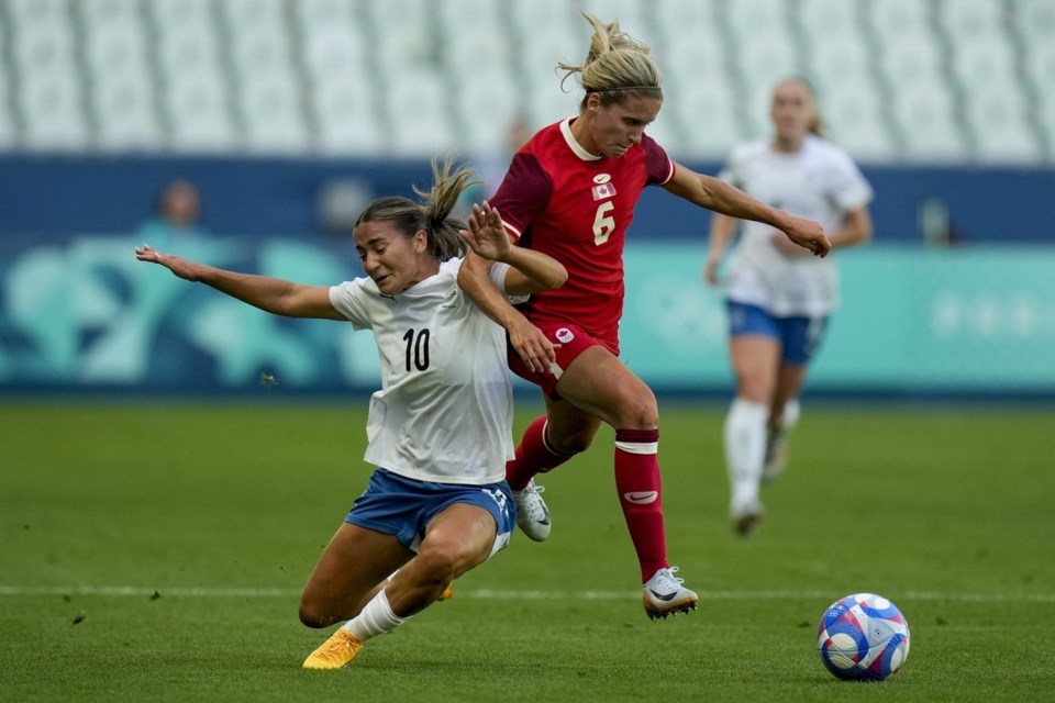 Defending champion Canada tops New Zealand 21 in Olympic soccer opener