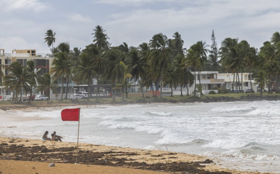 Ernesto becomes a hurricane after pummeling northeast Caribbean and knocking out power in the region