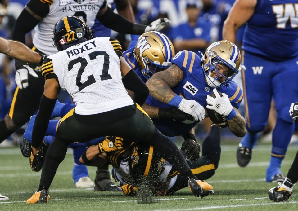 Bombers late TD drive lifts them past pesky Ticats 26-23