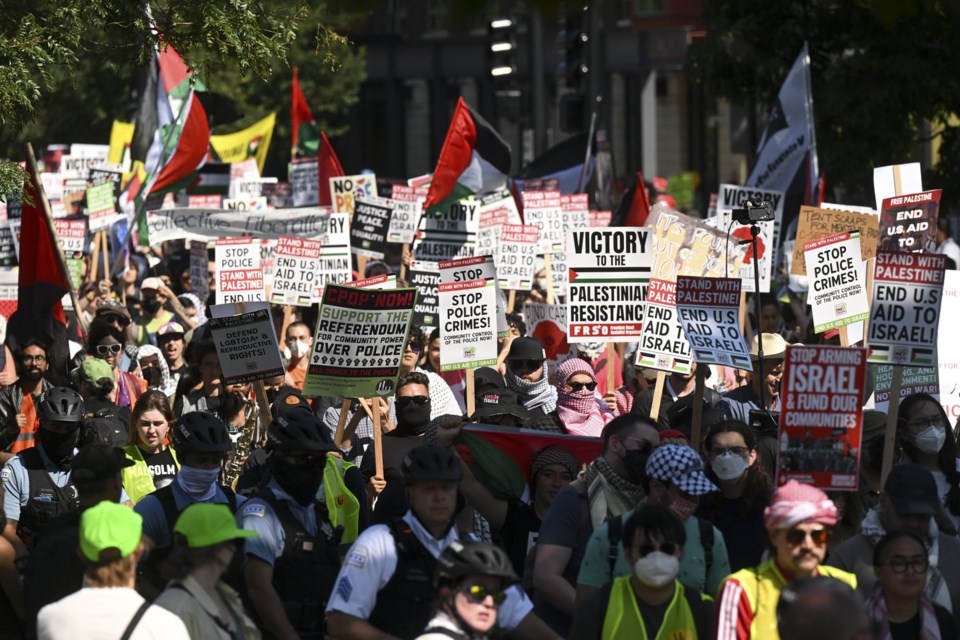 The Latest: Protests kick off as Democrats ready for Night 1 of the DNC