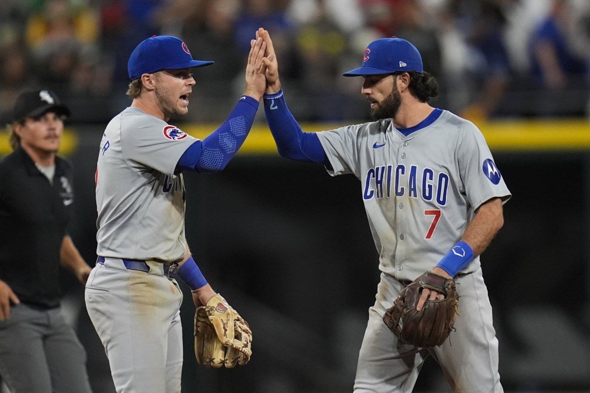 Happ, Bellinger go deep as Cubs hang on to beat White Sox 7-6, spoil ...