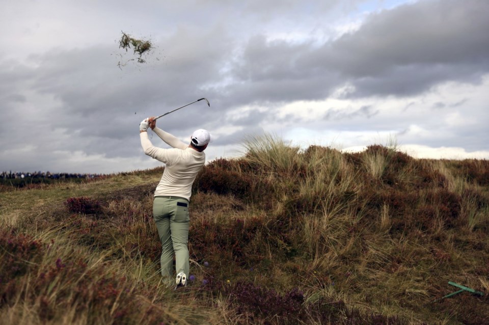 Rory McIlroy survives a strong wind for a 69 to lead Irish Open over