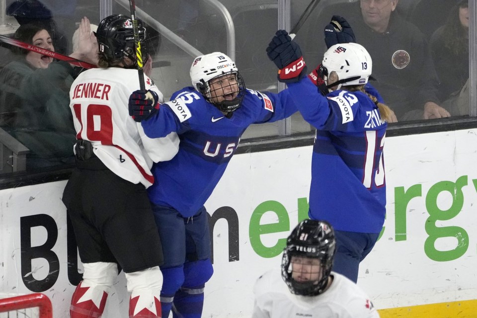 Lacey Eden scores 2 of the United States' 5 goals in the first period and the Americans rout Canada