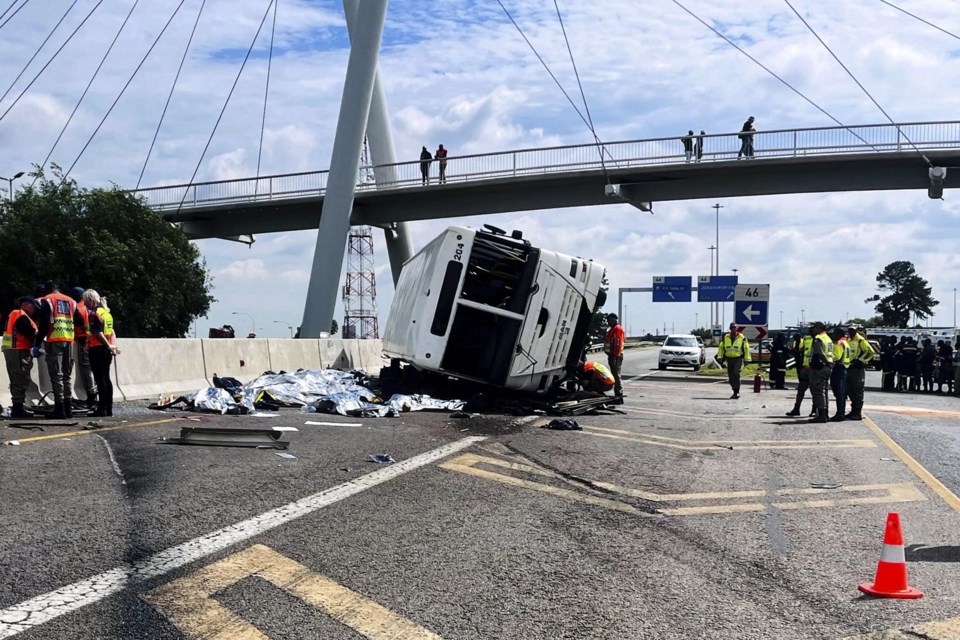 12 dead, dozens hurt as a bus overturns and passengers are thrown on a highway in South Africa