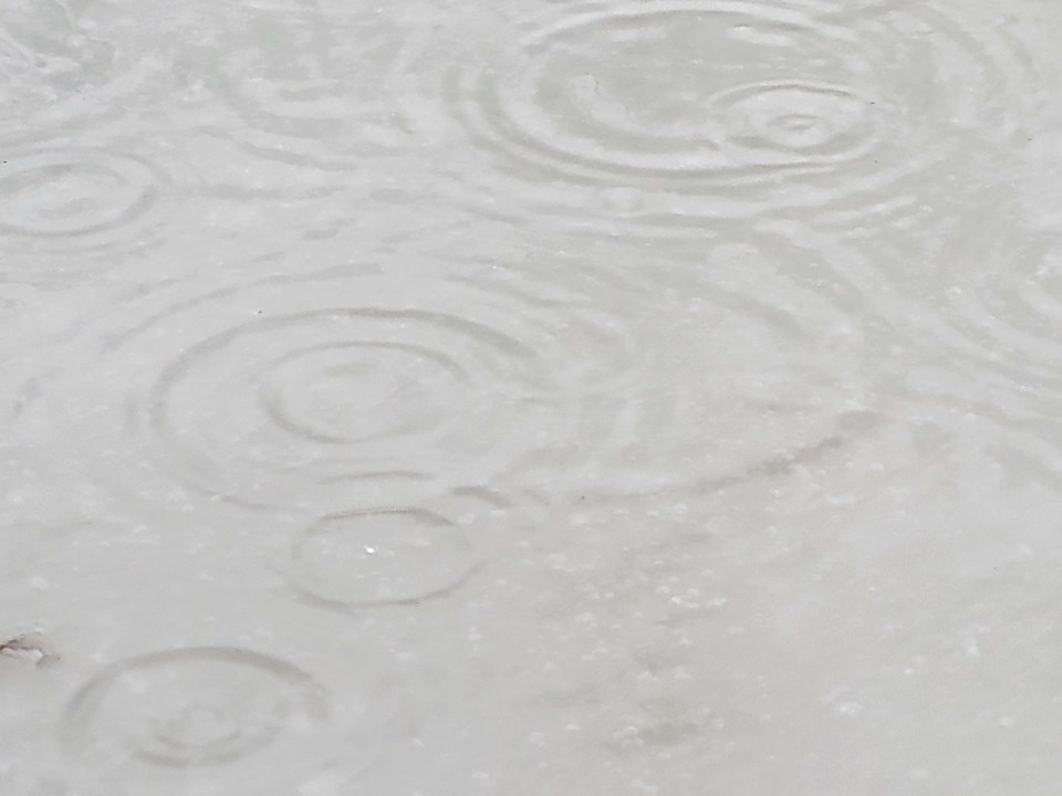 city-reflection-in-puddle-at-bright-sunny-day-stock-photo-3173521