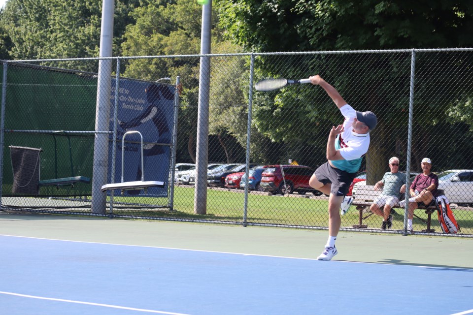 USED good-morning-sept-22-steve-tremblay-serves-at-the-notl-tennis-club-courts-at-veternans-memorial-park