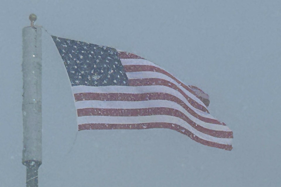 USED 20250210-sl-snow-usa-flag