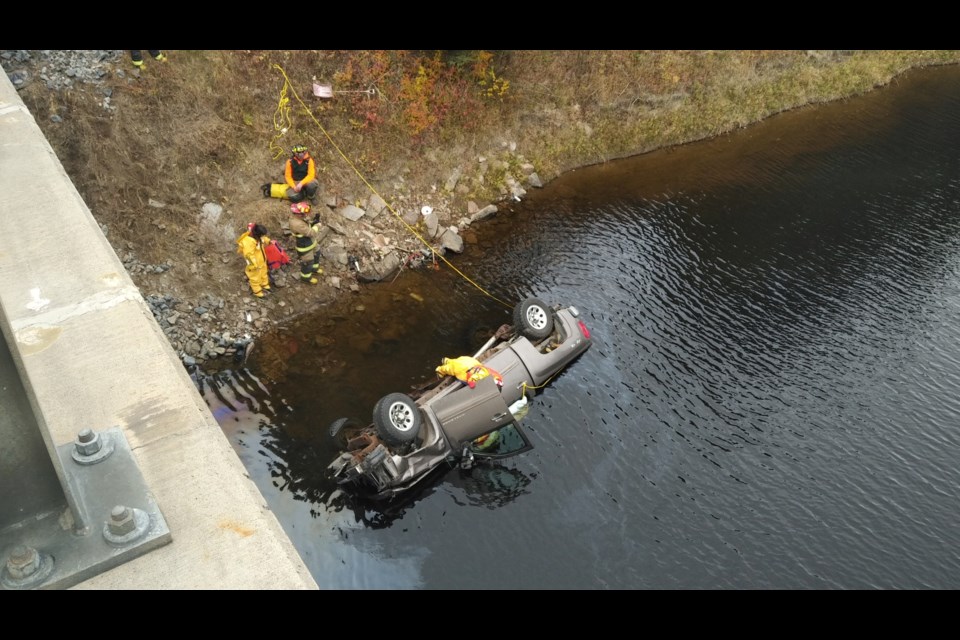 Emergency services responded after a vehicle was found overturned in the Aguasabon River on Oct. 21, 2023 (Facebook/Schreiber Fire Dept.)