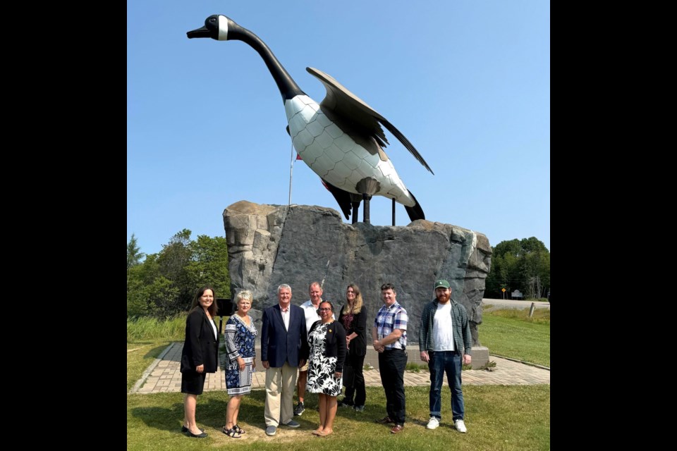 The Mayors of Wawa, Hornepayne, and Dubreuilville pose with MP Terry Sheehan in front of Wawa's Goose monument on July 26, 2024.