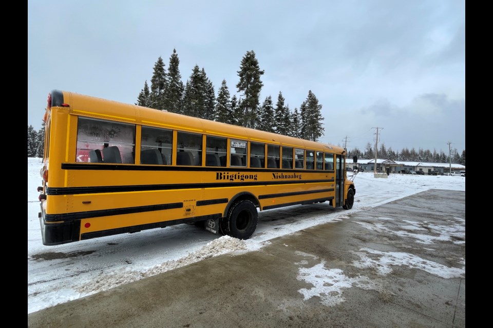 A school bus sits outside of Biigtigong Nishnaabeg Endzhi-gkinoohmaading, awaiting students on Feb. 12, 2024.