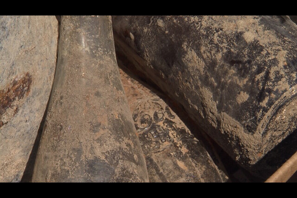 Other than a bone, objects that were found at the site included glass bottles and houseware dated from the mid-to-late 20th century.